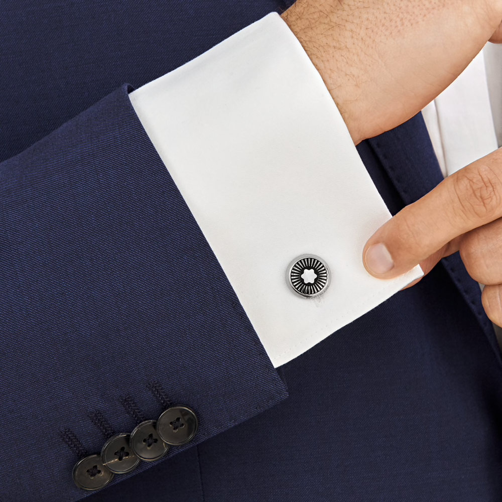 Cufflinks, round in stainless steel with ray pattern and mother-of-pearl snowcap emblem